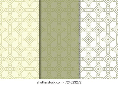 Olive green and white geometric ornaments. Set of vertical seamless patterns for web, textile and wallpapers