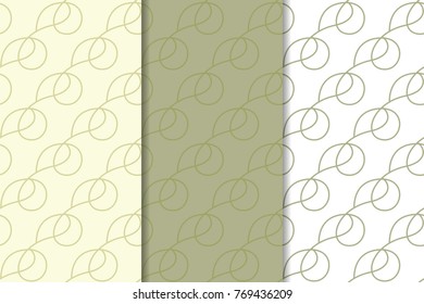 Olive green and white geometric ornaments. Set of vertical seamless patterns for web, textile and wallpapers