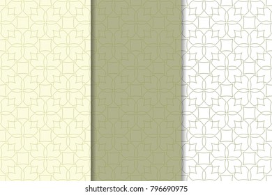 Olive green and white geometric ornaments. Set of vertical seamless patterns for web, textile and wallpapers