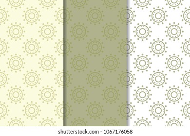 Olive green and white geometric set of vertical seamless patterns for web, textile and wallpapers