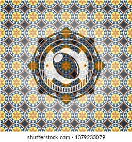 olive icon inside arabesque emblem background. arabic decoration.
