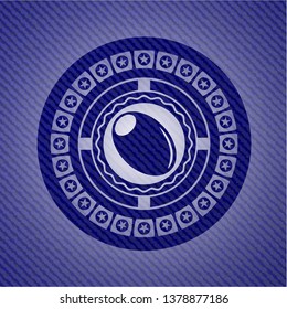 olive icon inside badge with jean texture