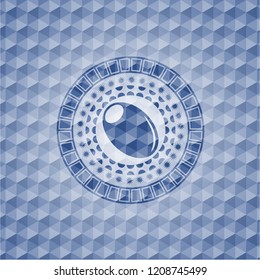 olive icon inside blue emblem with geometric pattern.
