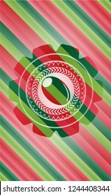 olive icon inside christmas colors style badge.