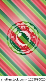 olive icon inside christmas emblem background.