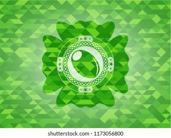 olive icon inside green emblem with mosaic background