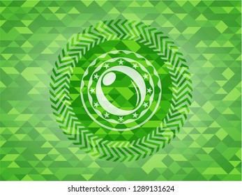 olive icon inside green emblem with triangle mosaic background