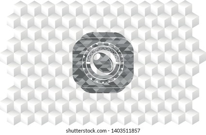 olive icon inside grey badge with geometric cube white background