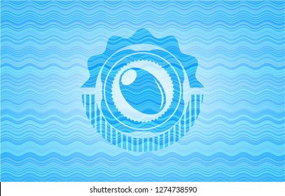 olive icon inside light blue water wave style badge.