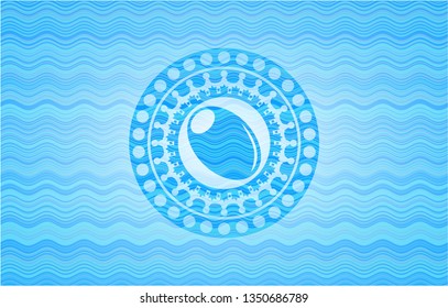 olive icon inside light blue water emblem background.