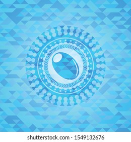 olive icon inside light blue emblem. Mosaic background