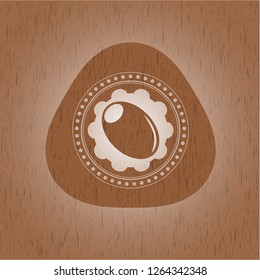 olive icon inside realistic wood emblem