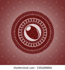 olive icon inside red emblem