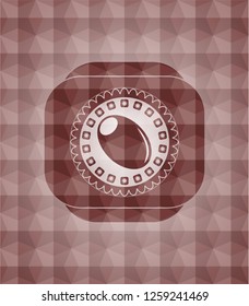 olive icon inside red seamless emblem or badge with abstract geometric polygonal pattern background.