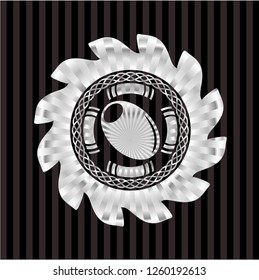 olive icon inside silver badge or emblem