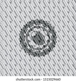 olive icon inside silver badge or emblem. Scales pattern. Vector Illustration. Detailed.