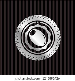 olive icon inside silvery badge