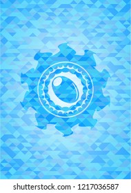 olive icon inside sky blue emblem with triangle mosaic background