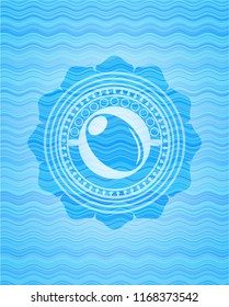 olive icon inside water concept badge.