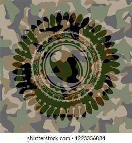 olive icon on camo pattern