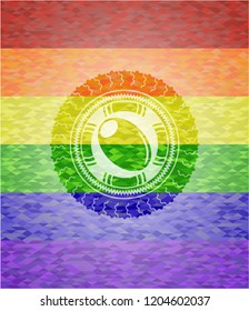 olive icon on mosaic background with the colors of the LGBT flag