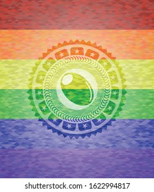 olive icon on mosaic background with the colors of the LGBT flag