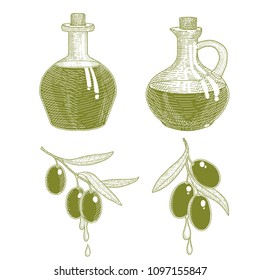 Olive oil bottles and olive branches with oil drop isolated on white.
