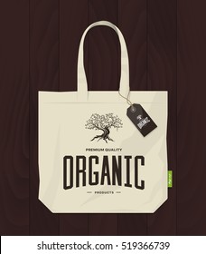 Olive tree vintage logo concept isolated on dark wooden background mock-up. Web infographic organic product tree pictogram. Premium quality burlap shopping eco bag with tree logo illustration mockup.