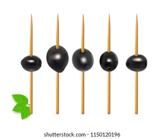 Olives on toothpick. Vegetarian canapes on skewers.