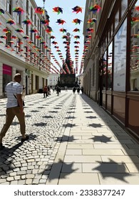 Olomouc, Czech Republic, July 27.2023. Urban street ubrella silhouettes