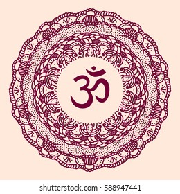 Om symbol with hand drawn mandala.