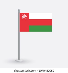 Oman flag. The national flag of Oman on a pole. The waving flag. The sign and symbol of the country. Realistic vector on white.