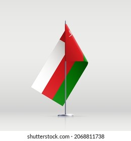 Oman-Flaggenstaatsymbol einzeln auf nationalem Hintergrund. Grußkarte Nationaler Unabhängigkeitstag des Sultanats von Oman. Illustrationsbanner mit realistischer Staatsflagge.