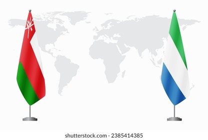 Oman and Sierra Leone flags for official meeting against background of world map.