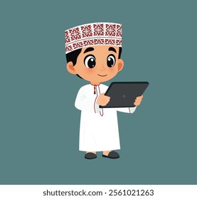 Omani Arabic boy holds a tablet for education