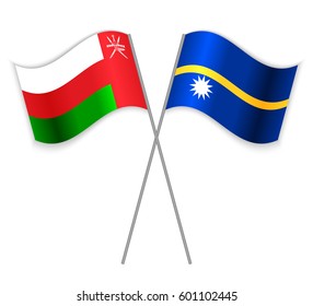 Omani and Nauruan crossed flags. Oman combined with Nauru isolated on white. Language learning, international business or travel concept.