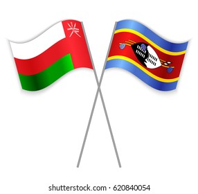 Omani and Swazi crossed flags. Oman combined with Swaziland isolated on white. Language learning, international business or travel concept.