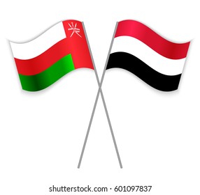 Omani and Yemeni crossed flags. Oman combined with Yemen isolated on white. Language learning, international business or travel concept.