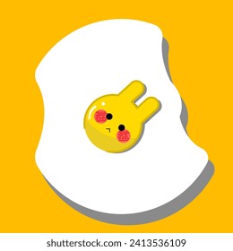 Omelet with egg yolk in the shape of a rabbit on a yellow background