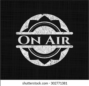 On Air chalk emblem written on a blackboard
