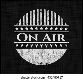 On Air chalkboard emblem written on a blackboard