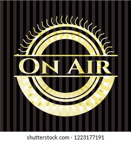 On Air gold emblem