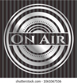 On Air silvery shiny emblem
