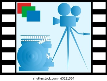 On the background of the image frame of film reels of film and film camera on a tripod.