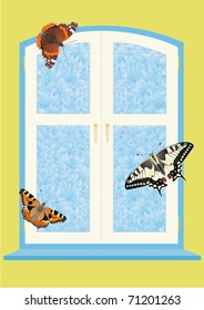 On the background of the window frame butterflies. Outside, the frost on the glass frosted patterns.