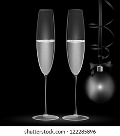 on black background are two glasses and black-white Christmas decoration
