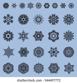 On a blue background. Celebratory vector set with 29 snowflakes. Vector illustration.
