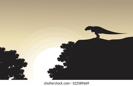 On the cliff Tyrannosaurus scenery of silhouettes