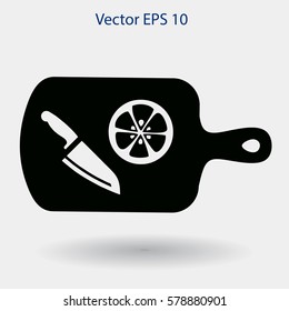 On a cutting board and knife is sliced lemon vector icon
