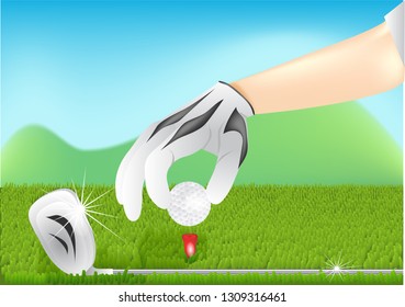 on the golf course. hand with a ball and a golf club